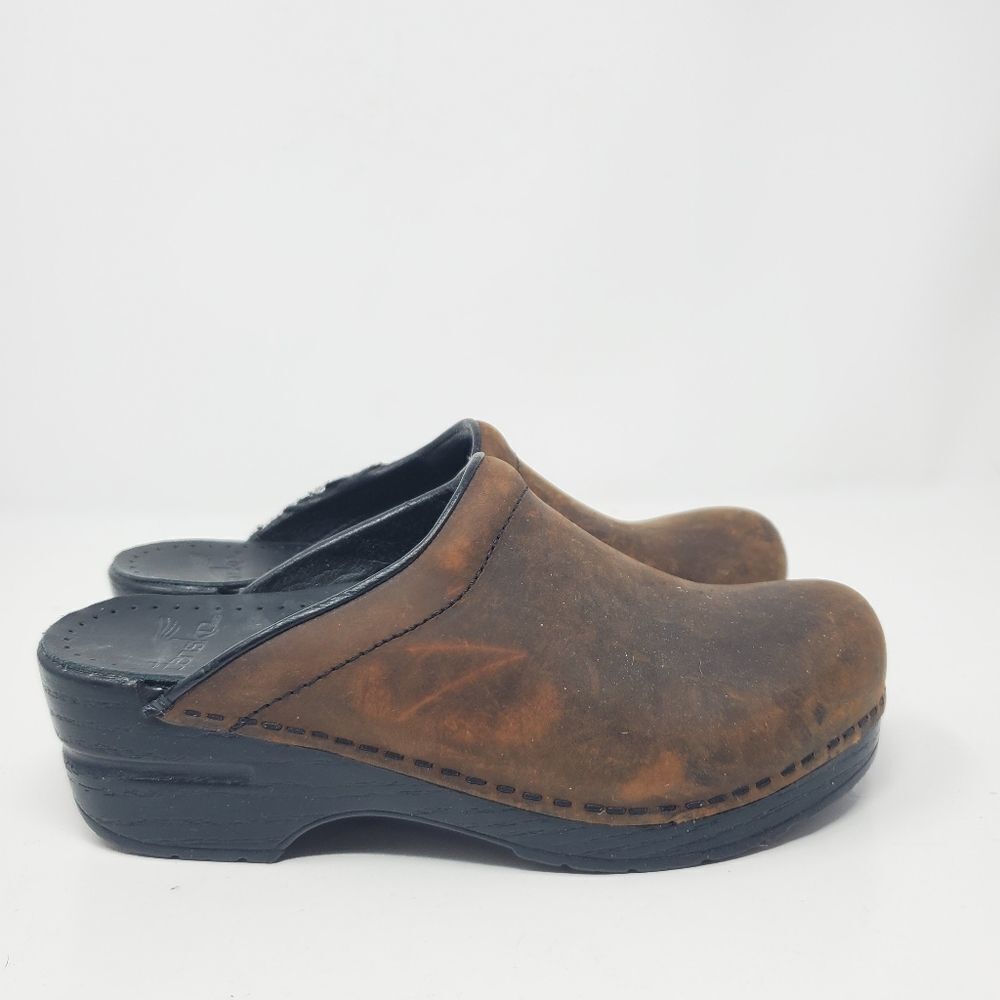 Dansko brown leather clogsUsed, but with lots of